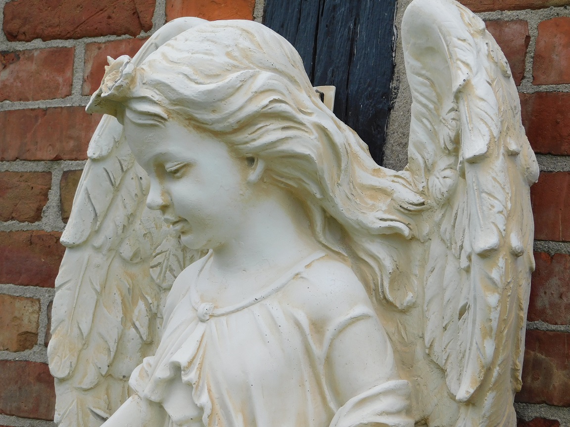 Engel met schaal - polystone - wanddecoratie