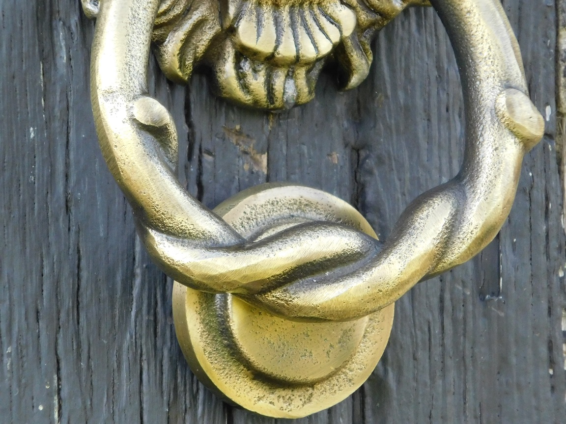 Doorknocker lion, antique iron - black/brass colour