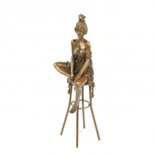 A bronze statue/sculpture of a lady on a bar stool (14)