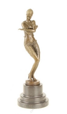 A bronze statue/sculpture of a coy dancer