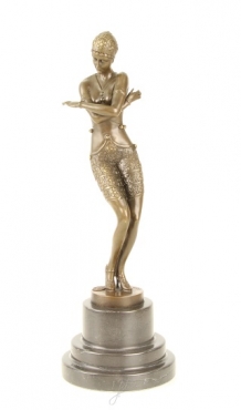 A bronze statue/sculpture of a coy dancer