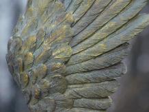 Set of two standing wings - polystone with wooden base