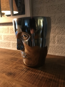 Beautiful aluminum vase, round in the shape of a face, nickel