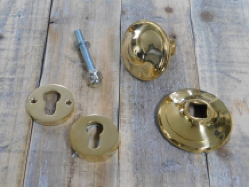 Fixed door knob - polished brass - with security roses