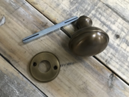 1 door knob with foot rosette, brass pat, is rotatable.