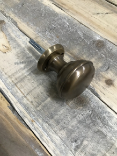 1 door knob with foot rosette, brass pat, is rotatable.