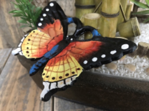 Beautiful cast-iron butterfly in wonderful colours.