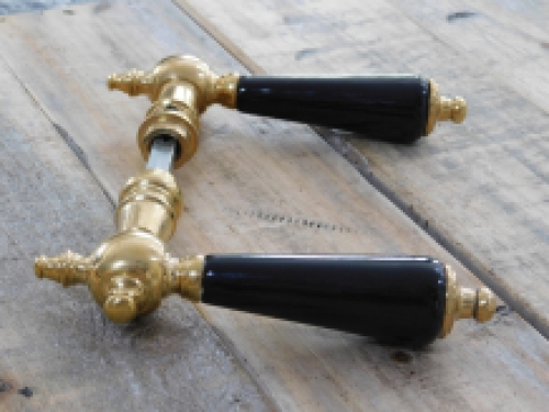 Set of door handles with rosettes - polished brass - with black ceramic handles