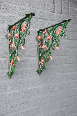 Beautiful set of shelf supports, shelf supports rose motif, cast iron-in matching color.