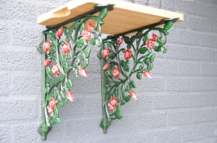 Beautiful set of shelf supports, shelf supports rose motif, cast iron-in matching color.