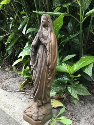 Statue of Mary full of stone, beautiful in detail, oxide color