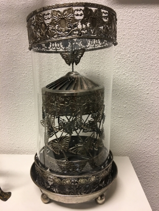 Beautiful metal lantern with separate rotating fire hood and cut glass.