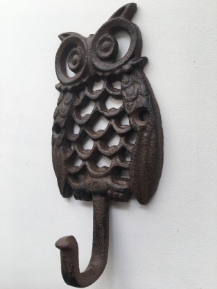 Wardrobe hook based on an owl, metal cast iron