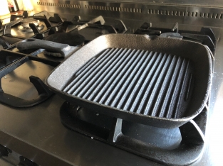 Heavy cast-iron grill pan, old-fashioned top quality.