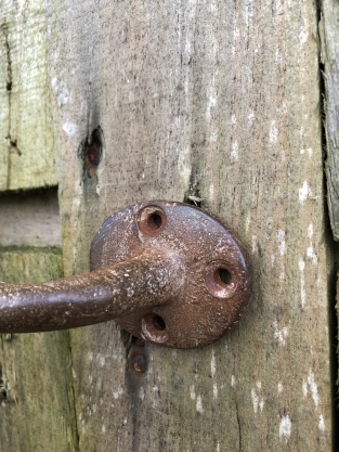 Door handle round-base made of solid iron - large- rust brown coated.