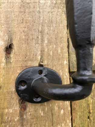 Door handle round base made of solid iron - large-rust blackcoated.