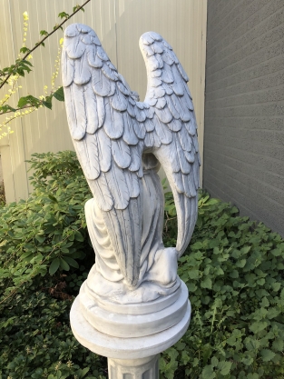 Angel - weatherproof, kneeling, on a pedestal, full of stone, large statue.