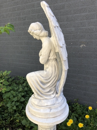 Angel - weatherproof, kneeling, on a pedestal, full of stone, large statue.