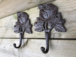 Set of coat hooks with a rose, coat rack in cast iron, antique, brown