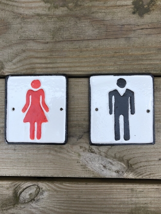 Set of signs for toilet door, cast iron painted, Man + Woman