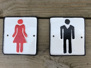 Set of signs for toilet door, cast iron painted, Man + Woman