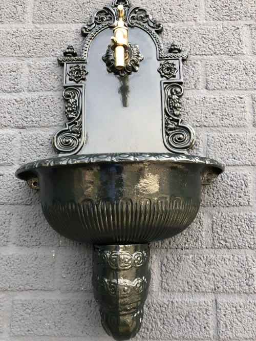 Top quality wall fountain, sink heavy aluminum dark green with brass faucet.