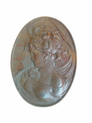 Vrouwelijk wandornament, gietijzer