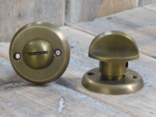 Toilet door hardware, twist lock, brass patinated