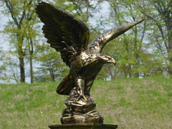 Eagle on pedestal - polystone - gold/black