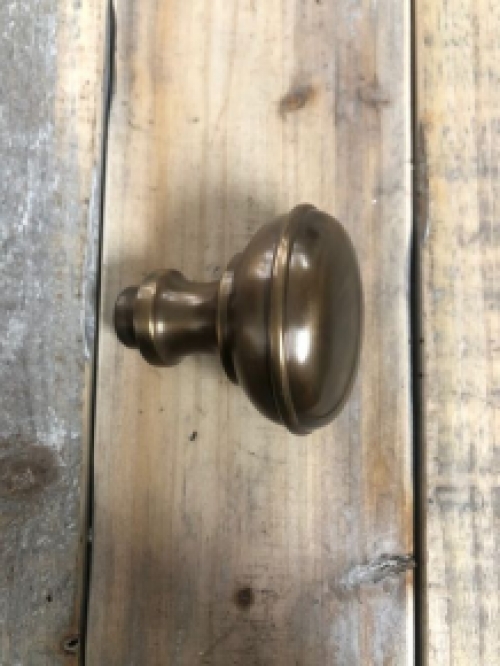 Door knob - turnable - brass patinated