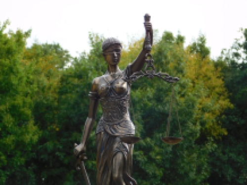 A large statue of Lady Justice, bronze-look, very beautiful!