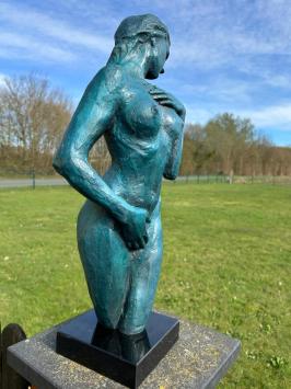 Elegant blue bronze statue of a nude woman on marble base