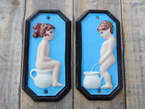 Set of signs for toilet door, cast iron painted, Man Woman