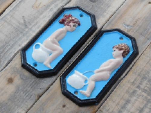 Set of signs for toilet door, cast iron painted, Man Woman