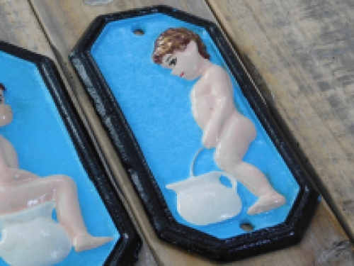 Set of signs for toilet door, cast iron painted, Man Woman