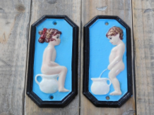 Set of signs for toilet door, cast iron painted, Man Woman