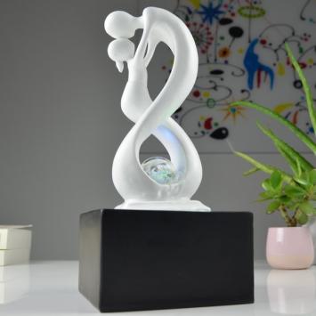 Indoor fountain, abstract sculpture with water ornament