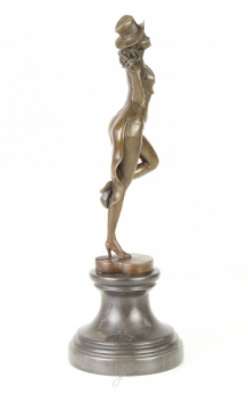 A bronze statue/sculpture of a theater dancer