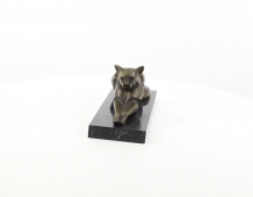 A bronze statue/sculpture of a lying cat, modernist style