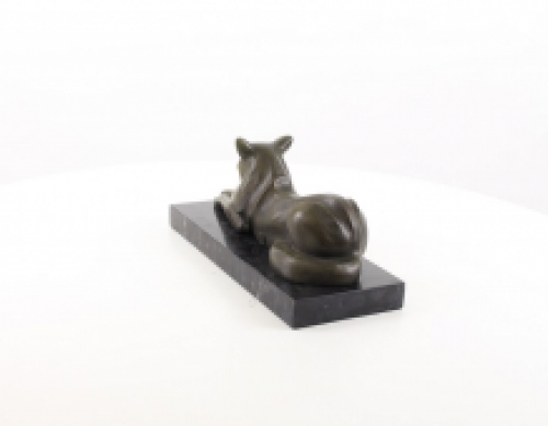 A bronze statue/sculpture of a lying cat, modernist style