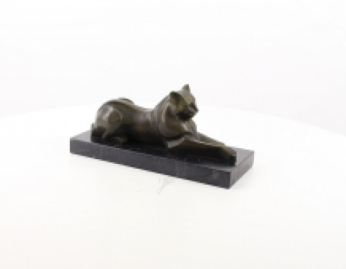 A bronze statue/sculpture of a lying cat, modernist style