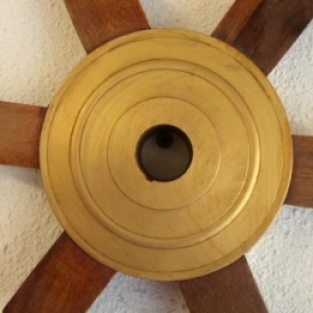 Solid wooden boat steering wheel with copper hub