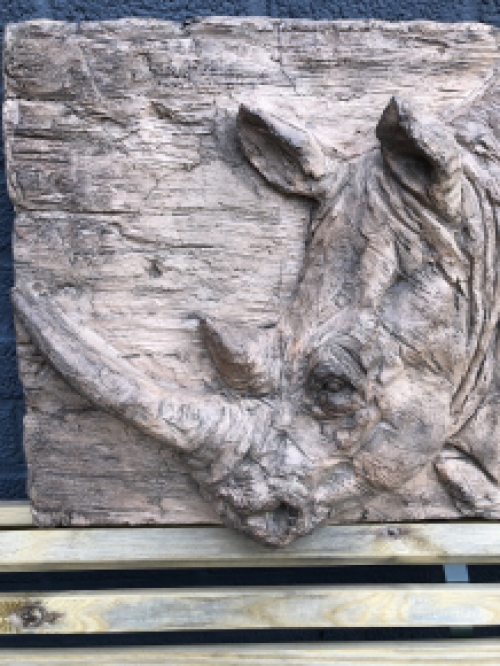Wall ornament wood look with 3D image of a rhino, polystone-wood.