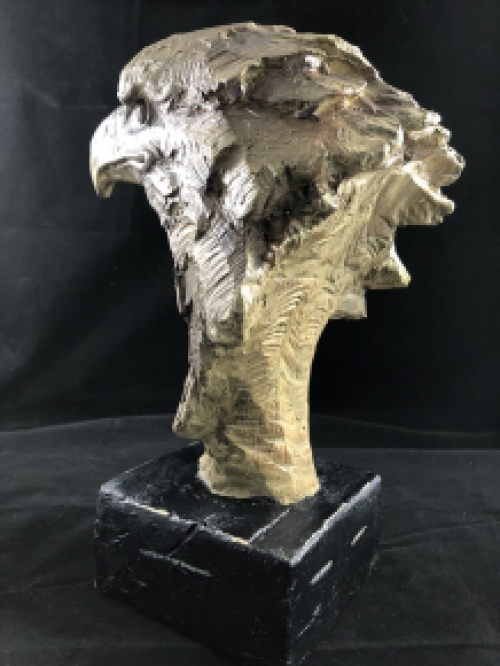 A beautiful head of an eagle, beautiful in detail, polystone wood look