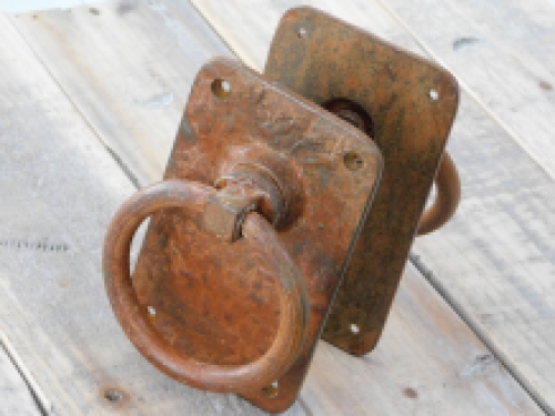 Rustic large rust colored rings as a door shutter/gate shutter set, beautifully nostalgic.