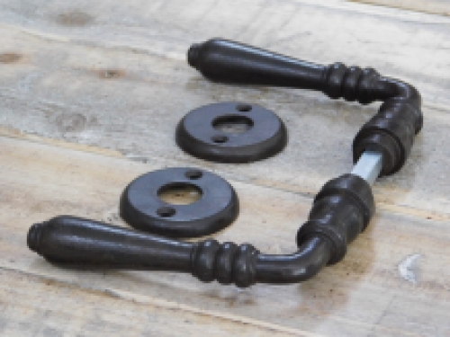 Door hardware set with 2 handles, 2 rosettes and a mandrel, dark brown