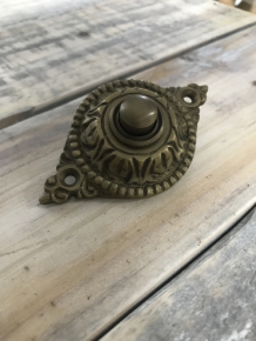 Ornate doorbell - patinated brass