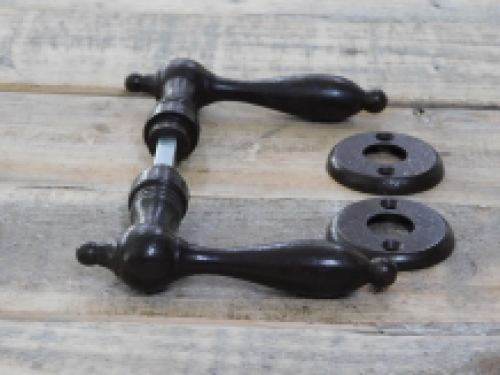 Door hardware set, 2 door handles, 2 rosettes and a mandrel, dark brown