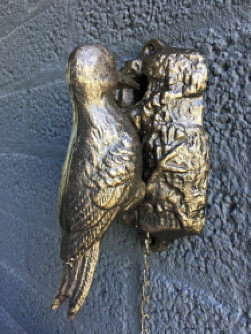 Beautiful distinct door knocker, woodpecker in bronze color, metal.