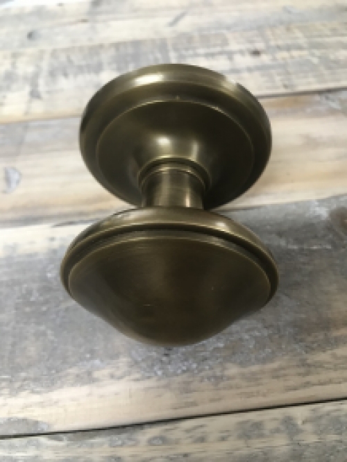 Fixed door knob - patinated brass - including rosette